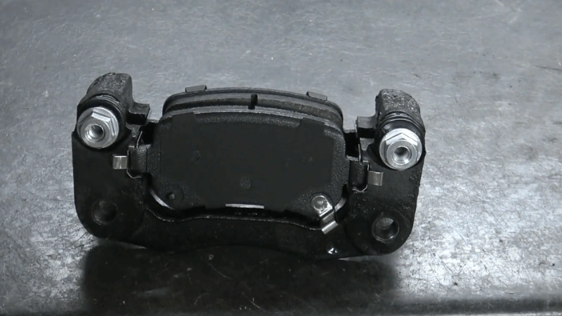 It is worn pad image in brake pads sticking.